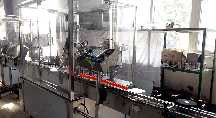 灌裝旋蓋一體機械設(shè)備